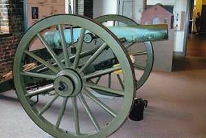 Civil war cannon within Tredagar Civil War background Center in Richmond.