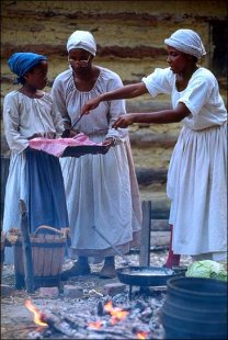 Slaves preparing meals